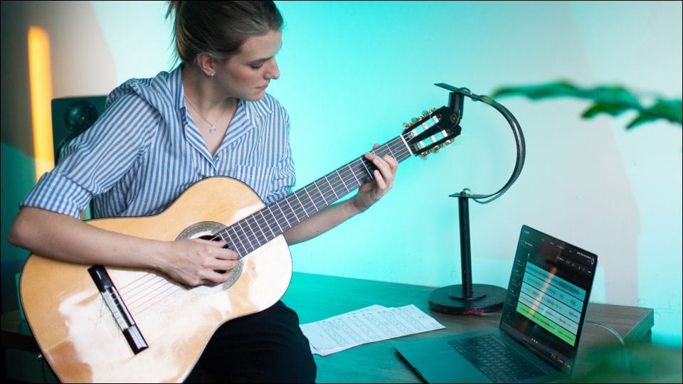 Woman playing guitar